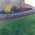 Randy's Landscape and Maintenance project - stone flower bed